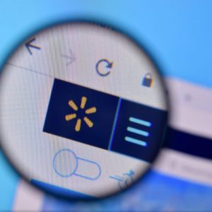 Walmart logo through magnifying glass
