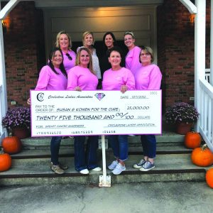 Members of Circlestone Ladie's Association present a donation of $25,000 for Breast Cancer Awareness.