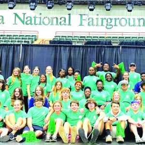 Local youth and volunteers from Cook County 4-H pose for a picture at Georgia National Fairgrounds