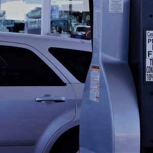 Photo of car and gas gump